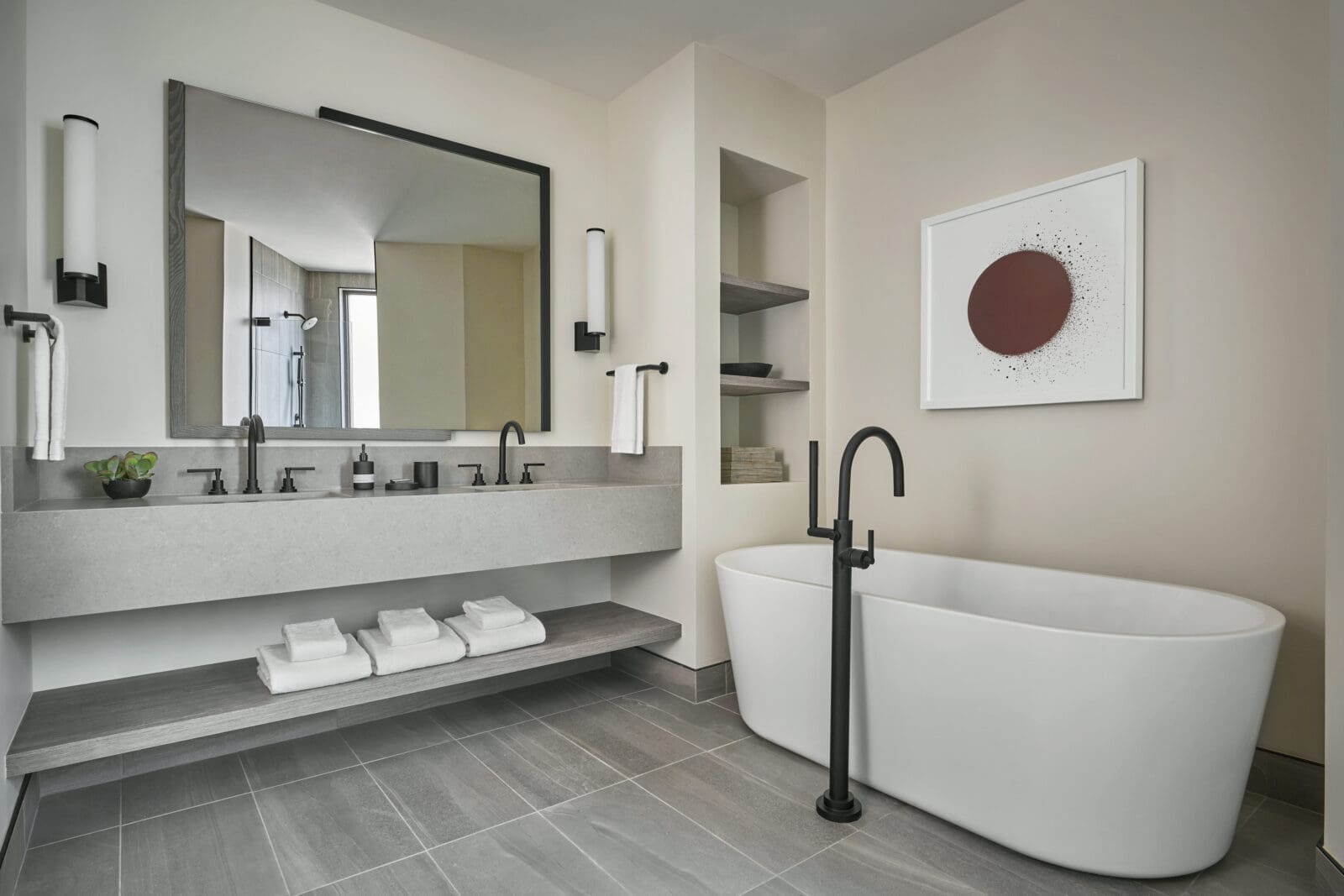 A free-standing tub in the spacious en-suite bathroom of a residence  (Photo by Pendry Park City)