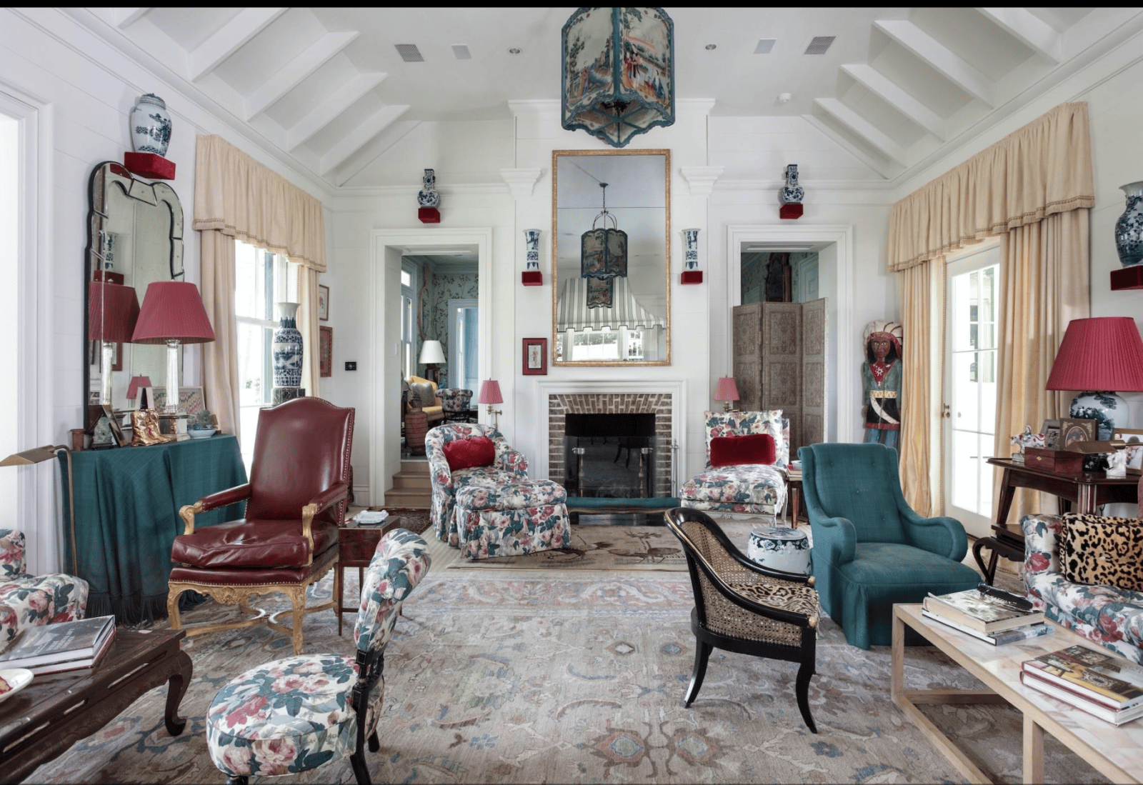 The living room in the main house at  Goodthyme Farm  features an elevated ceiling and wood burning fireplace (Photo by Kerry Kirk Photography)